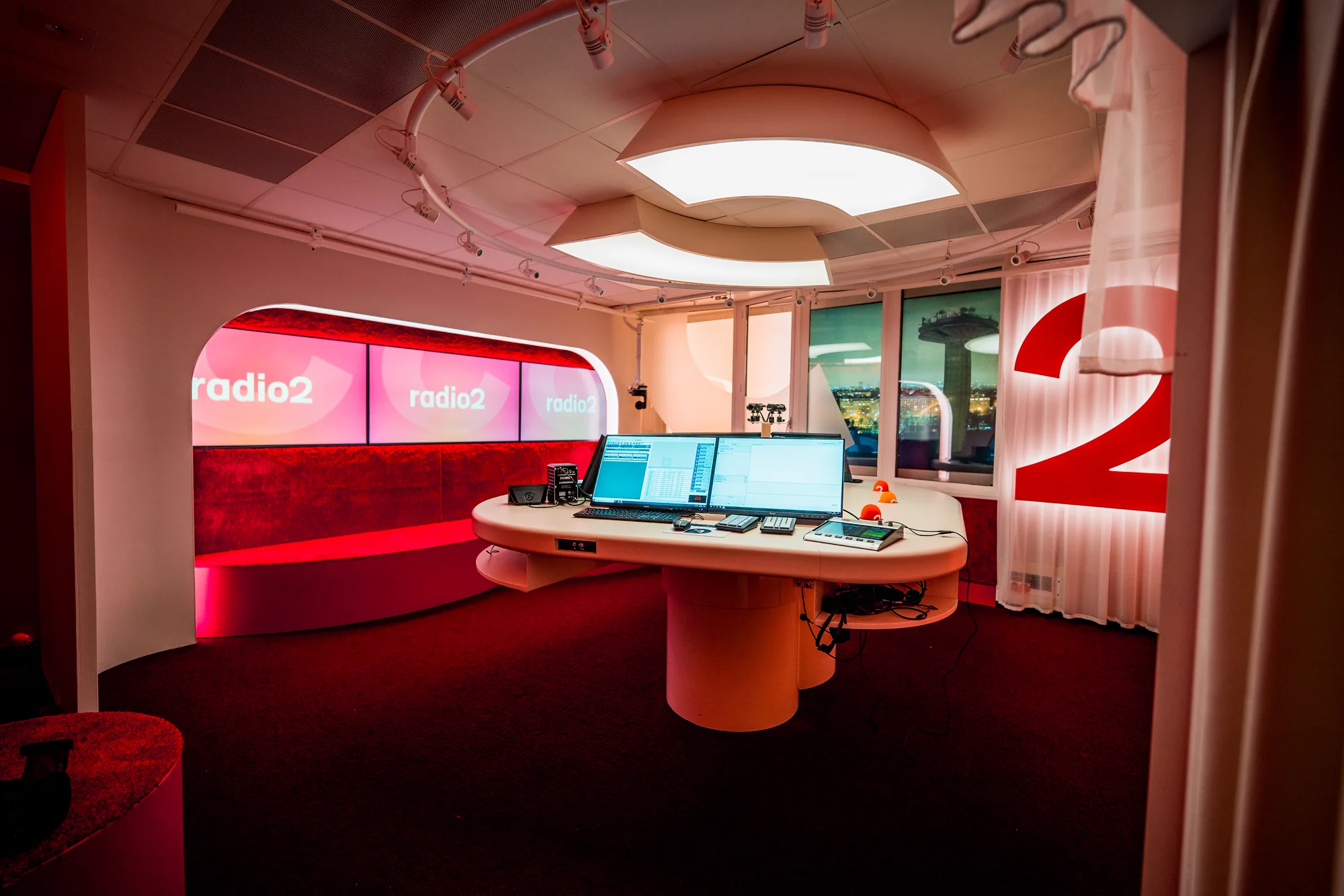 Radio 2 studio with a custom light ring above the round desk