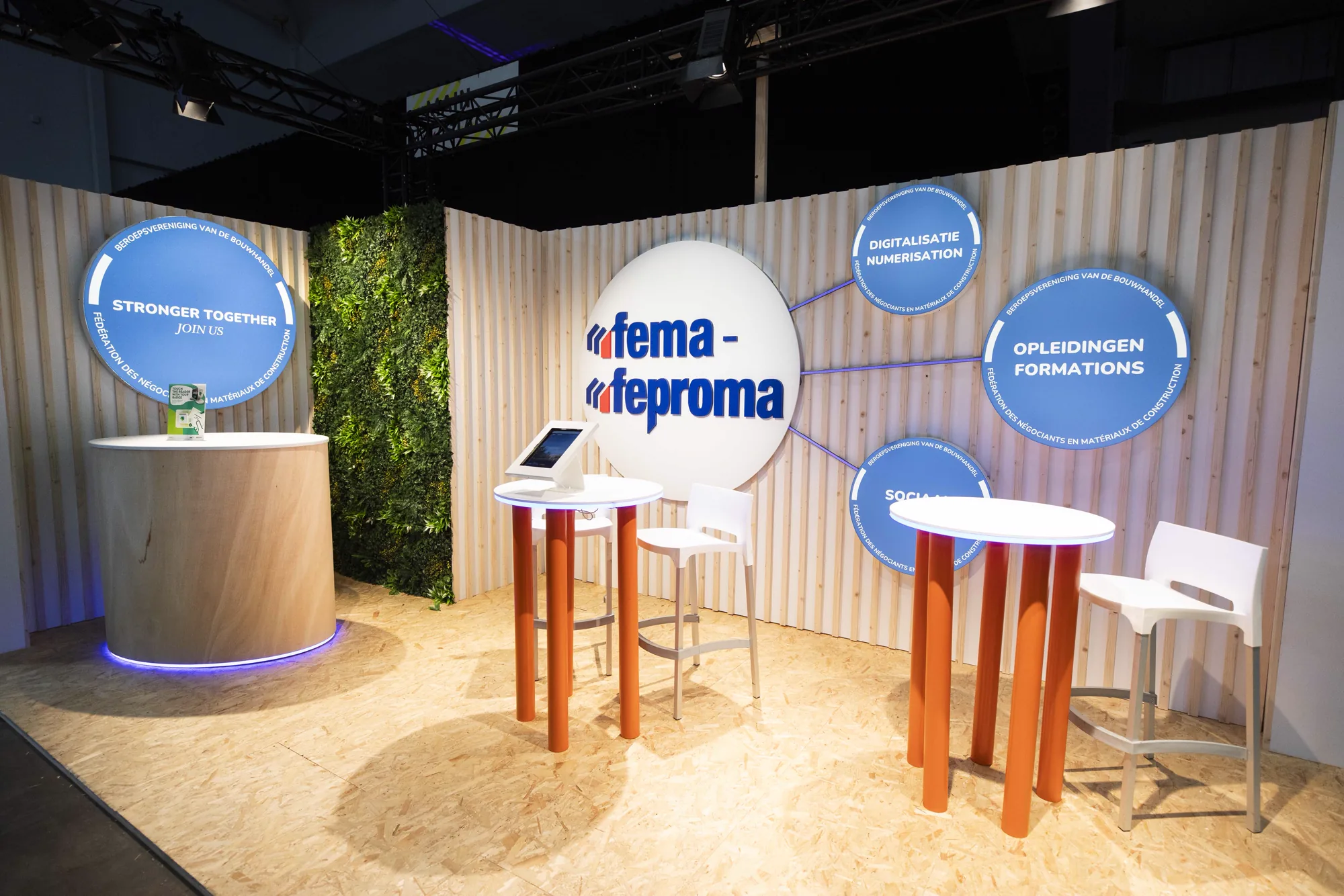 FEMA FEPROMA stand at Brussels Expo with an LED-lit counter