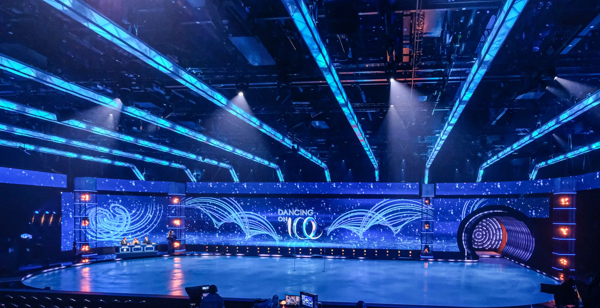 Dancing on Ice rink with LED lines above the set