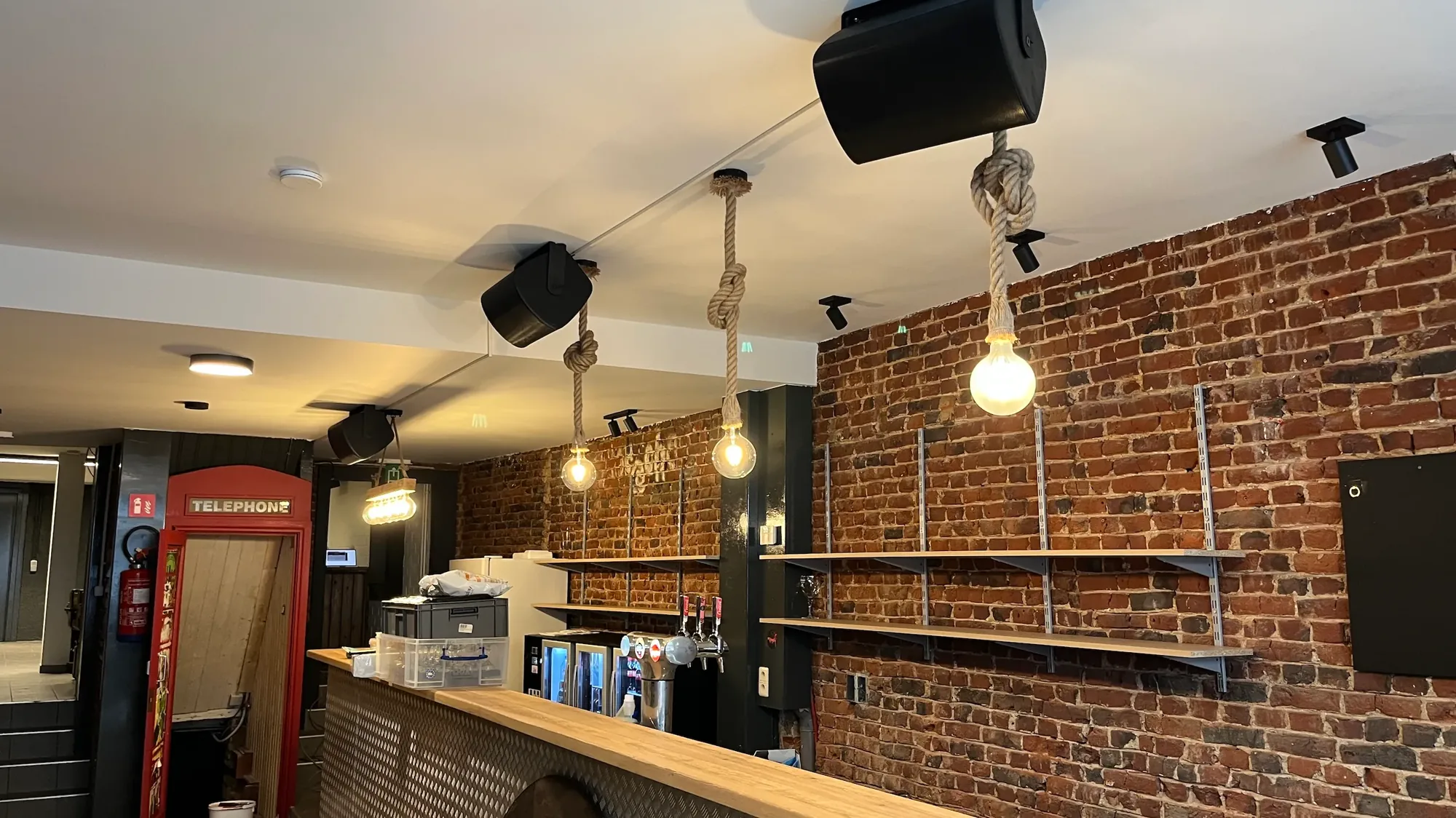 Loudspeakers above the bar of the youth centre in Ninove