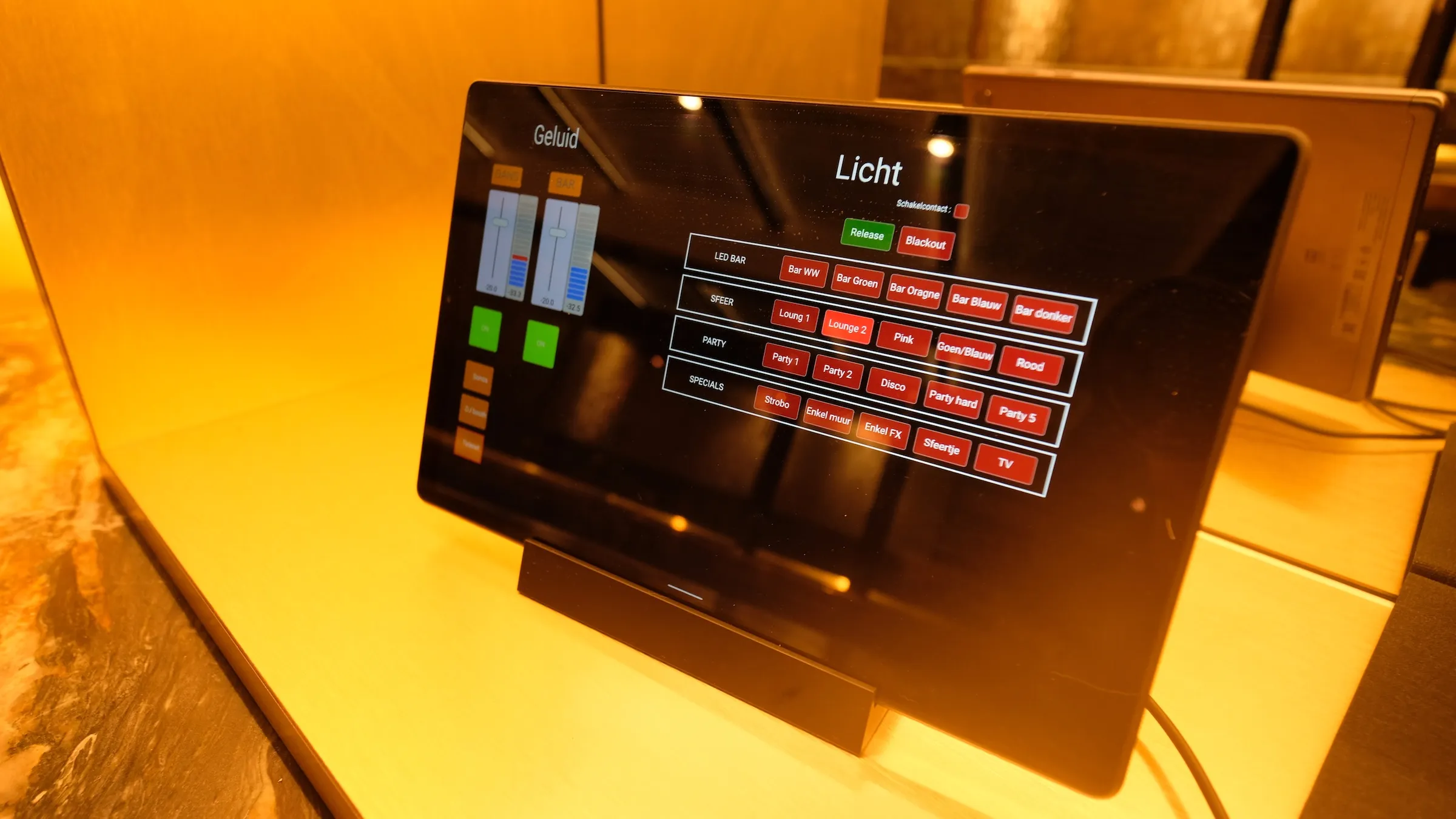 Tablet on a table showing lighting scenes for easy control