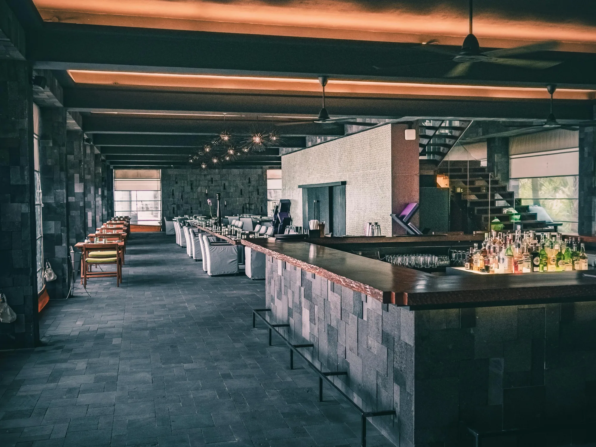 Bar and restaurant with indirect LED lighting in the ceiling coves